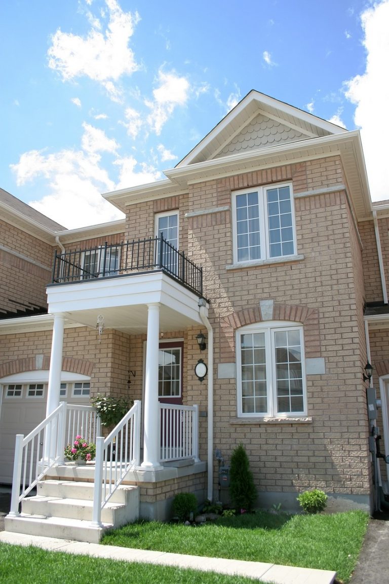 Home % Luxury real estate interior with high-end furnishings, elegant lighting, and polished flooring.
